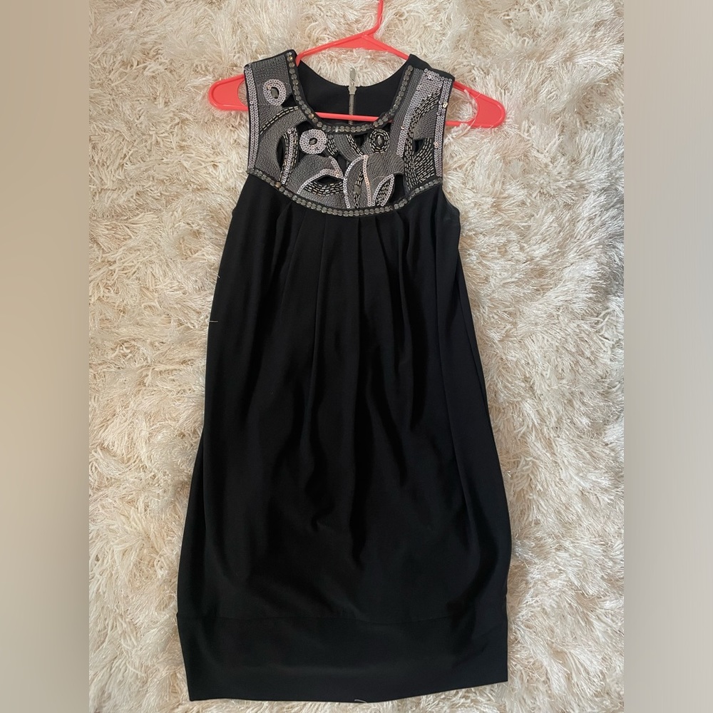 Black dress with sequin neckline. Sized for juniors 7/8